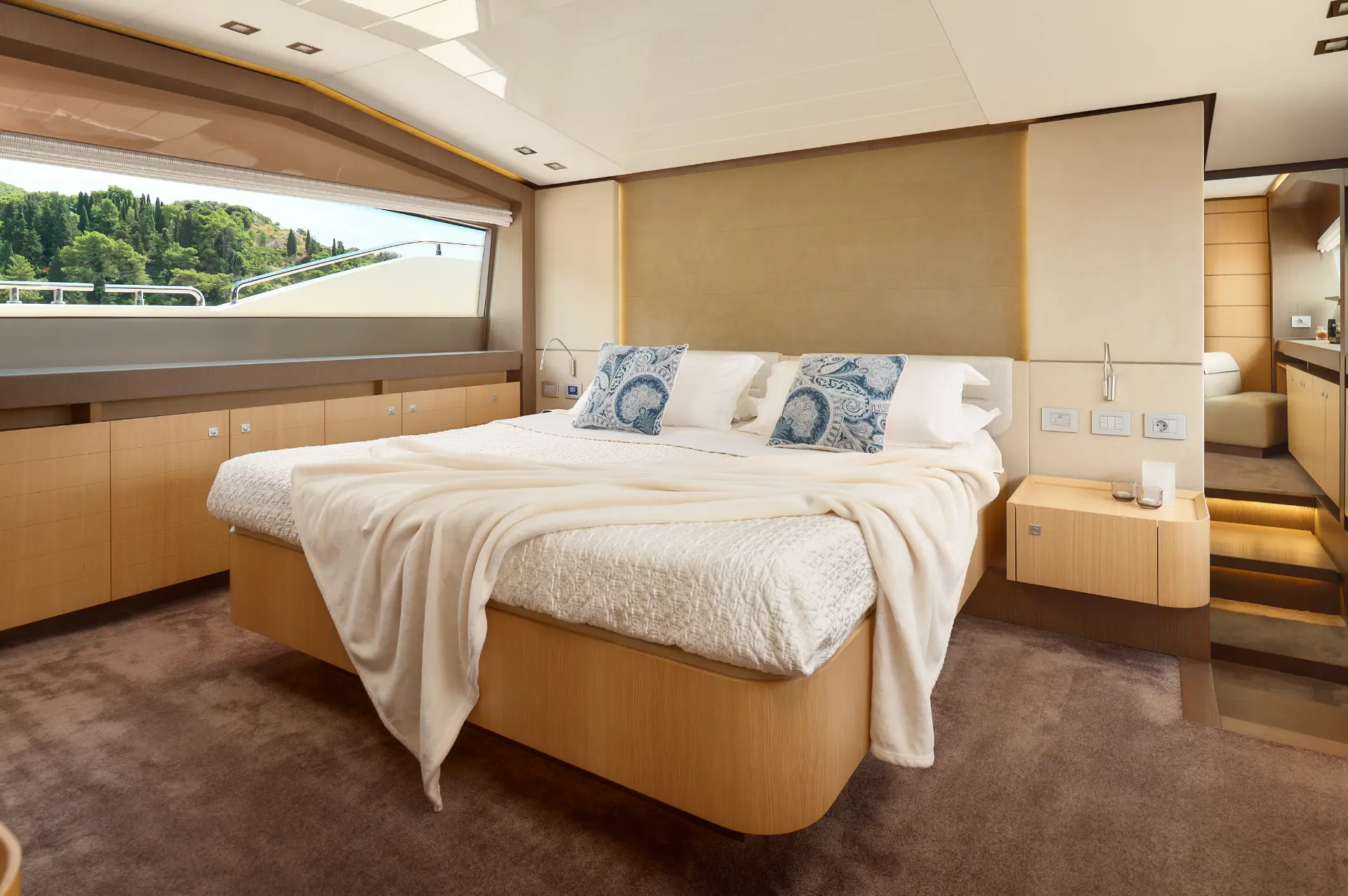 Iva – bright double bedroom featuring big windows and airy, light-filled space.