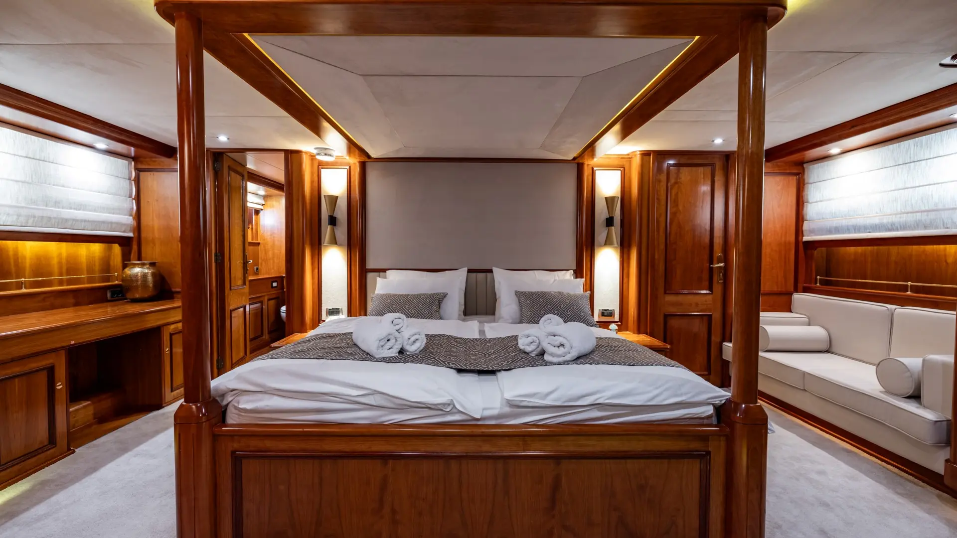 Sea Breeze II – spacious master bedroom featuring front bed view and side seating