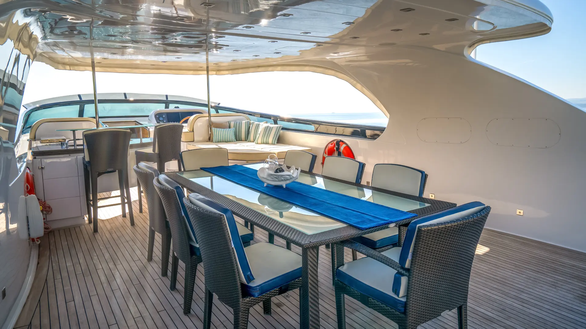 Cynthia – upper deck with shaded dining, full bar, and comfortable sunbathing space
